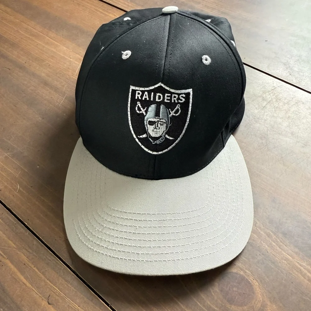 Raiders Black and Gray Cap Truckers Snap Back Hat